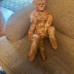 Vintage, unusual stuffed monkey with rubber face, feet and hands.  Steiff??